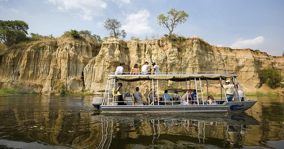 Transfer to Queen Elizabeth for a boat cruise and Night game drive